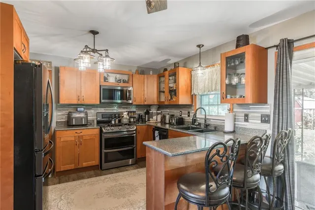 $310,000 | 1209 Crest Drive, Pleasant Hill, MO 64080