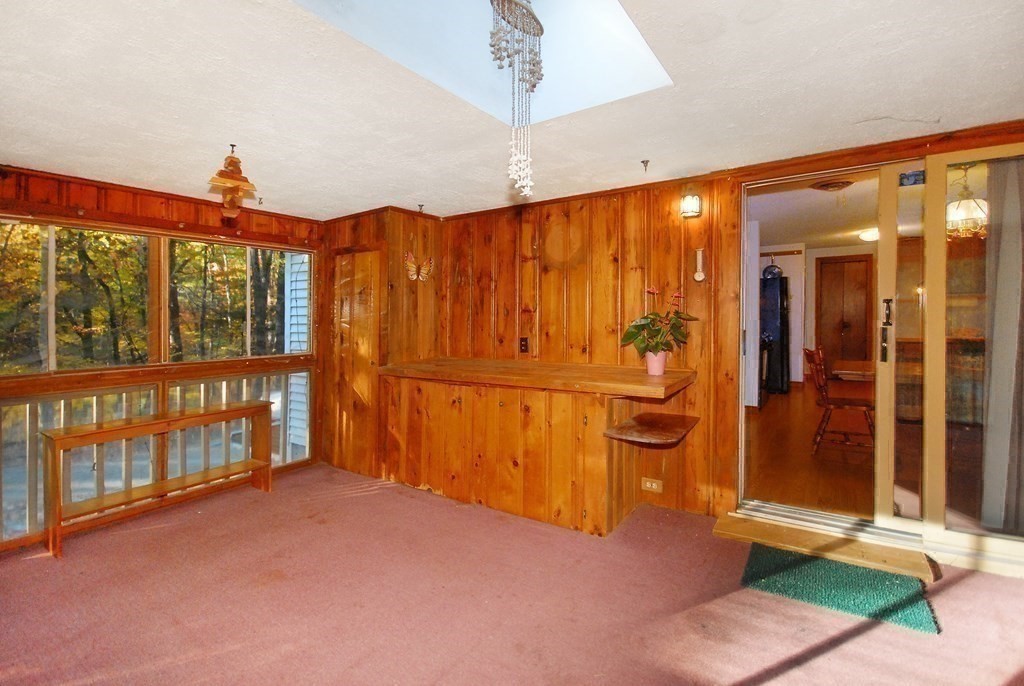 38 Blanchard Road Harvard, MA 01451 - Photo 11 of 26 a view of a porch with a door and a porch