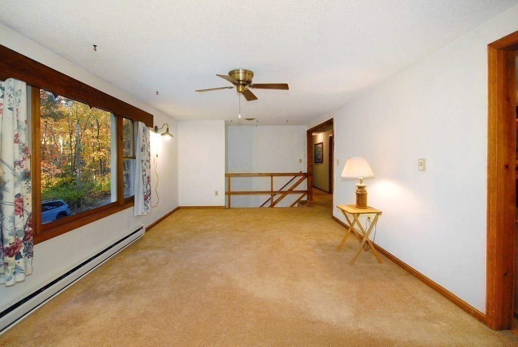 38 Blanchard Road Harvard, MA 01451 - Photo 13 of 26 a view of a livingroom with furniture and windows