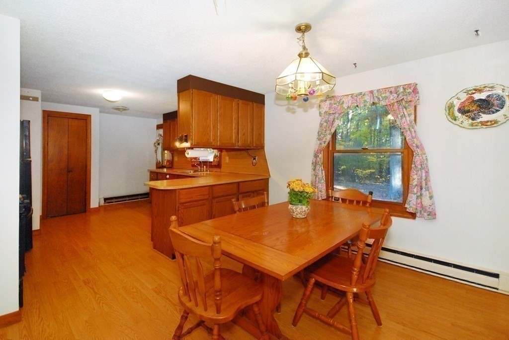 38 Blanchard Road Harvard, MA 01451 - Photo 10 of 26 a dining room with furniture and window
