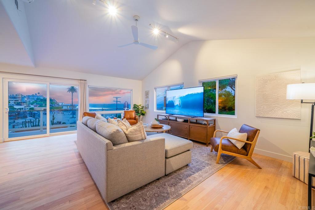 231 5th Street Encinitas, CA 92024 - Photo 7 of 57 a living room with furniture and a large window