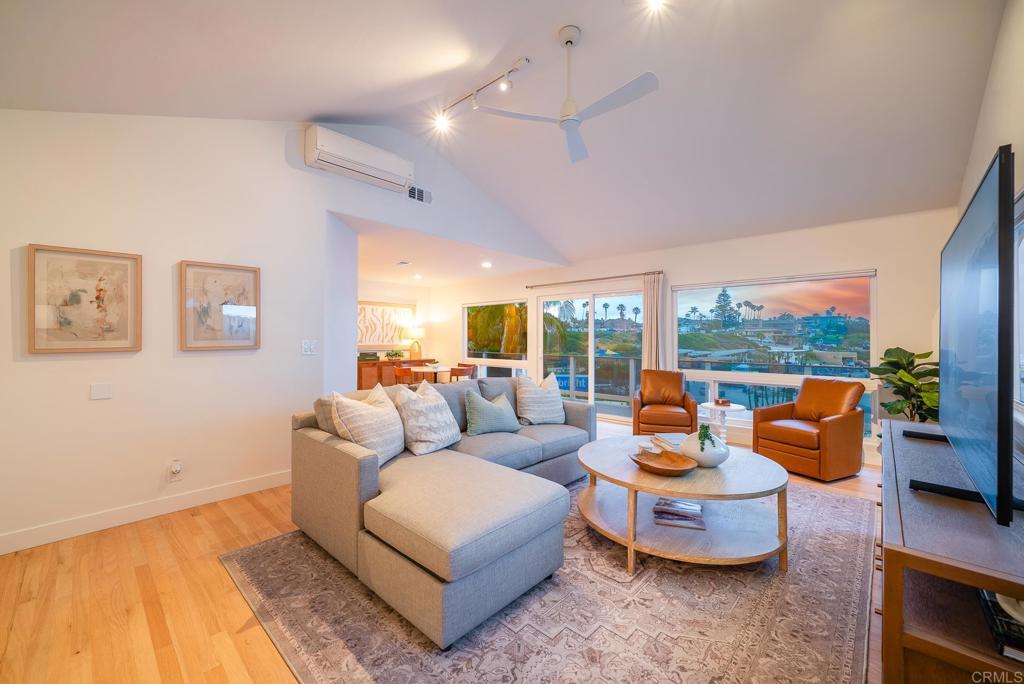 231 5th Street Encinitas, CA 92024 - Photo 8 of 57 a living room with furniture and a large window