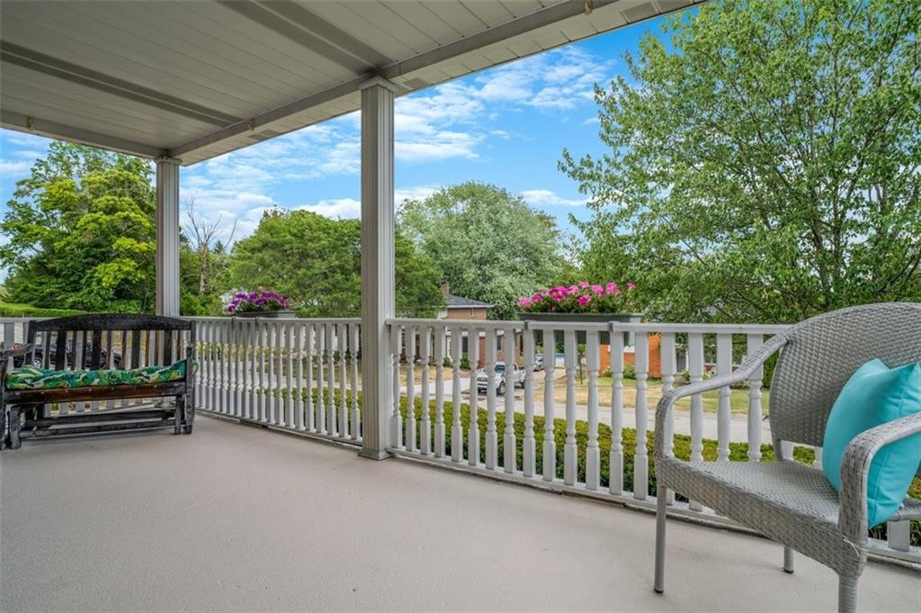 263 Mohawk Drive McKeesport, PA 15135 - Photo 32 of 45 a view of a deck with a floor to ceiling window and wooden fence