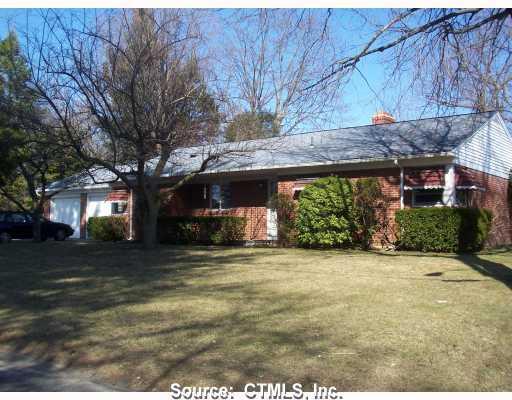 51 Pineridge Road Torrington, CT 06790 - Photo 1 of 1 a view of a house with a large tree and a yard