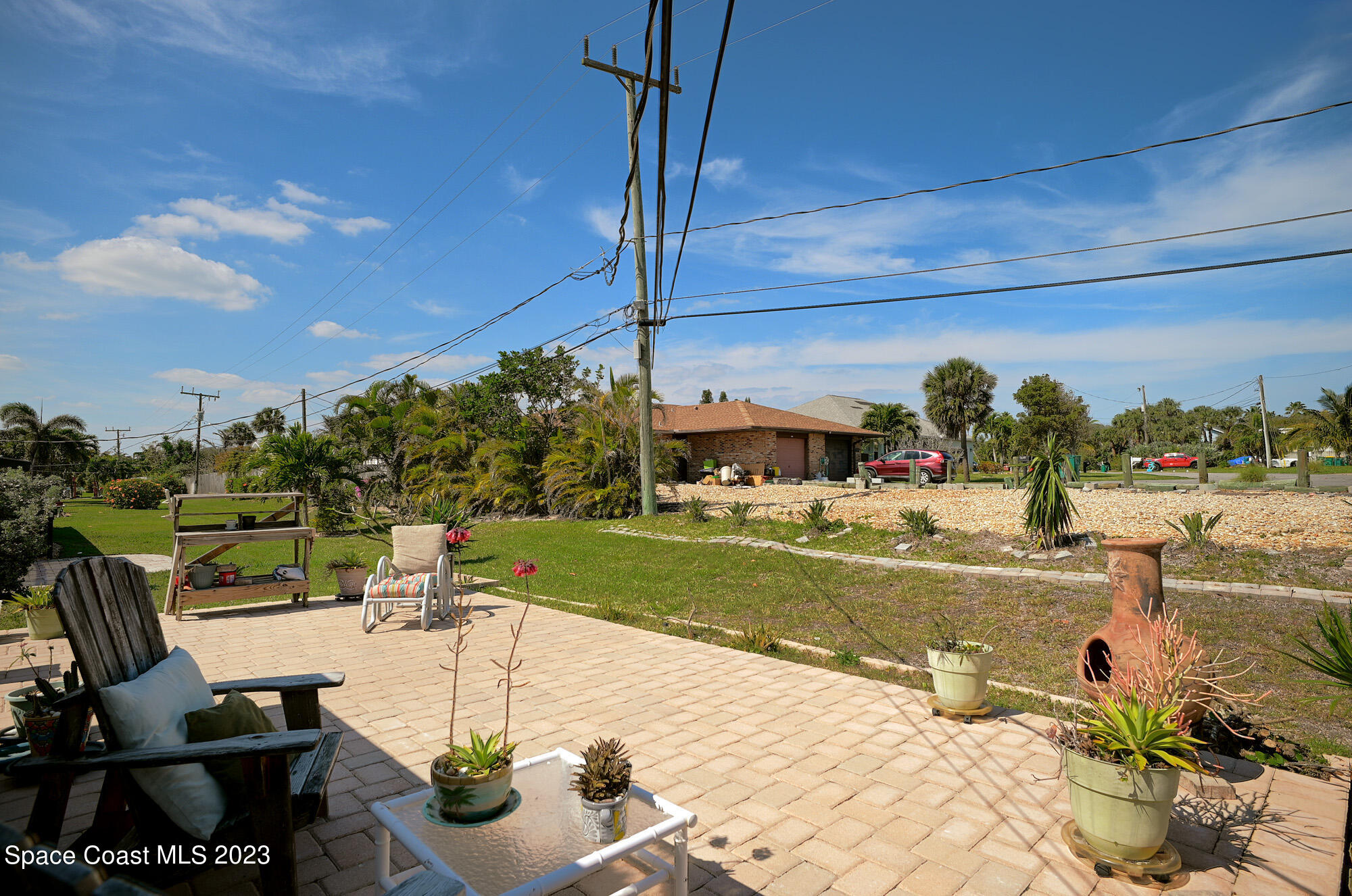 116 Normandy Place Melbourne Beach, FL 32951 - Photo 20 of 24 a view of a patio with swimming pool