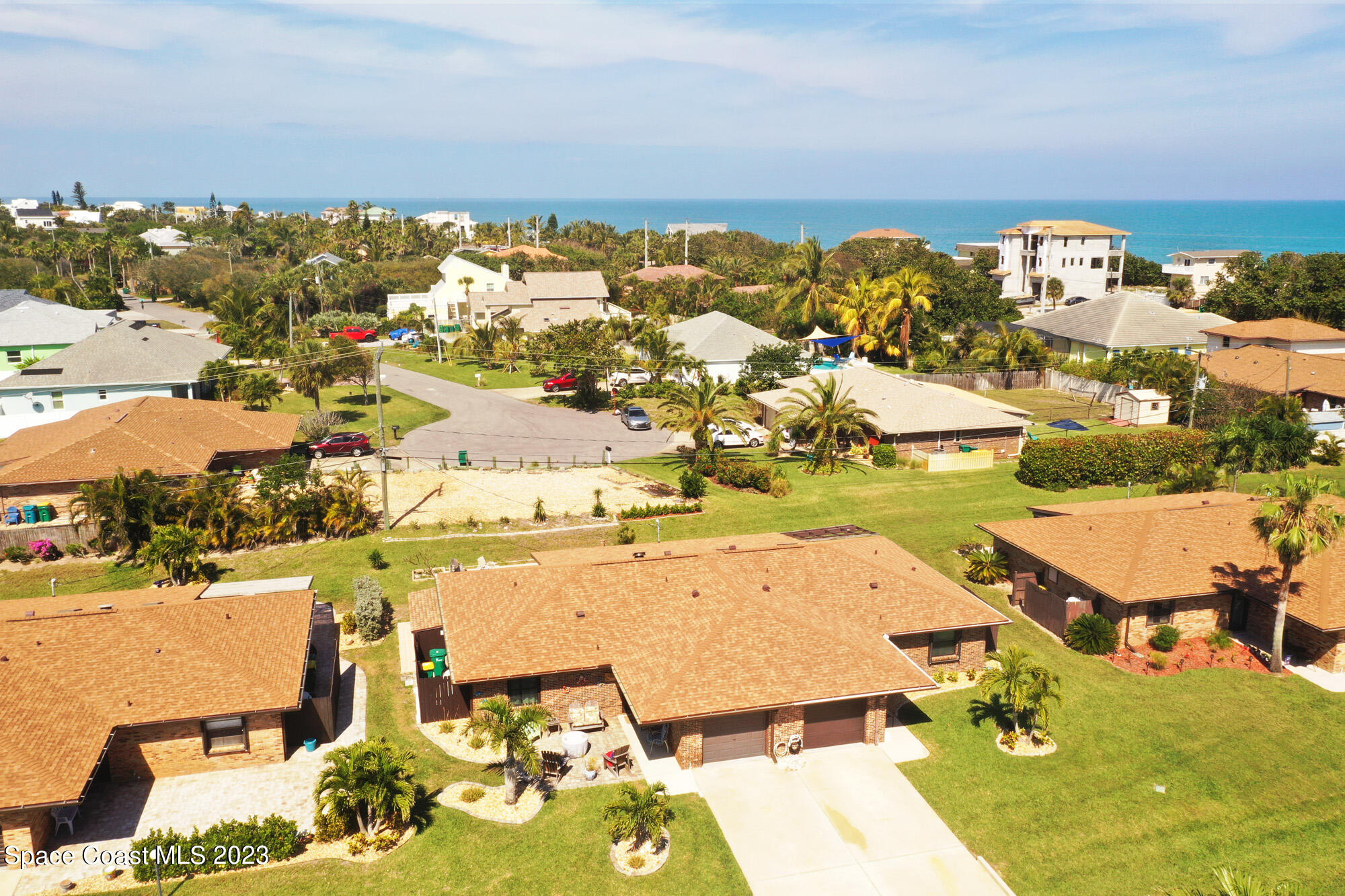 116 Normandy Place Melbourne Beach, FL 32951 - Photo 2 of 24 an aerial view of residential houses with outdoor space