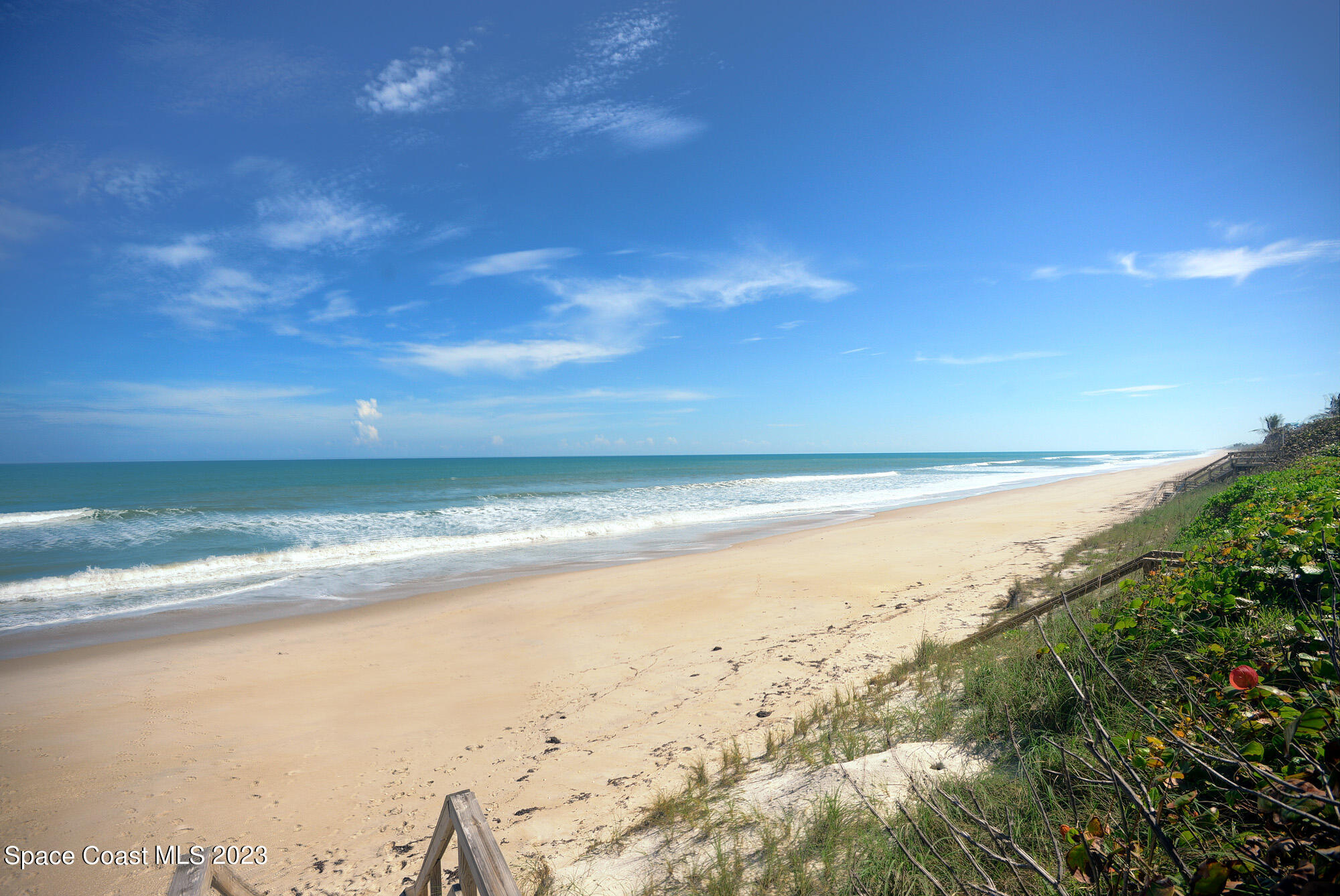 116 Normandy Place Melbourne Beach, FL 32951 - Photo 22 of 24 a view of an ocean and beach
