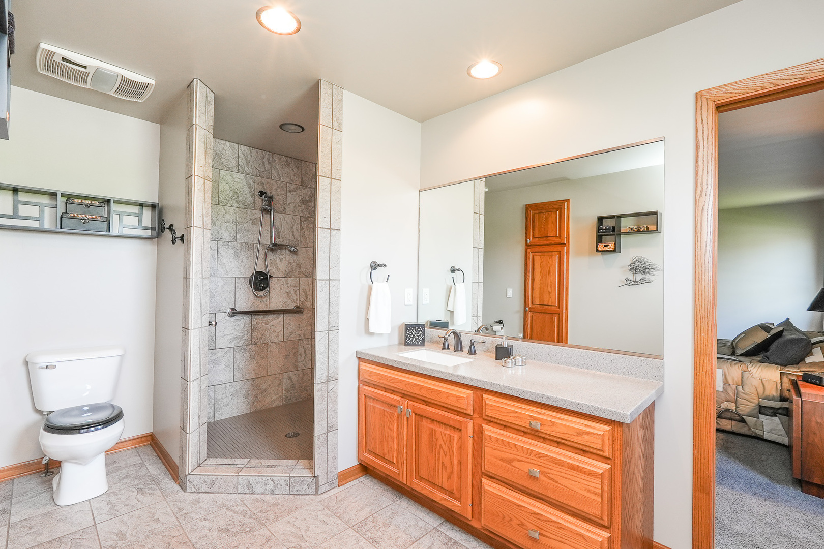 1135 Eagle Circle Bourbonnais, IL 60914 - Photo 22 of 36 a spacious bathroom with a toilet sink and shower