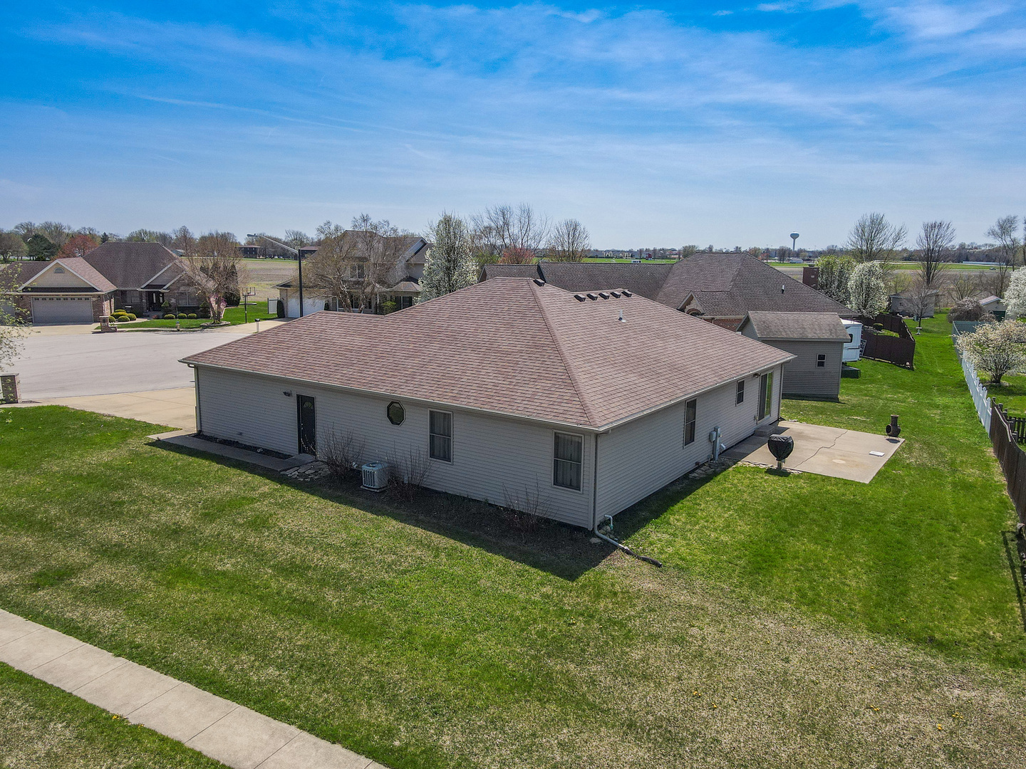 1135 Eagle Circle Bourbonnais, IL 60914 - Photo 36 of 36 a view of a big house with a big yard and large tree