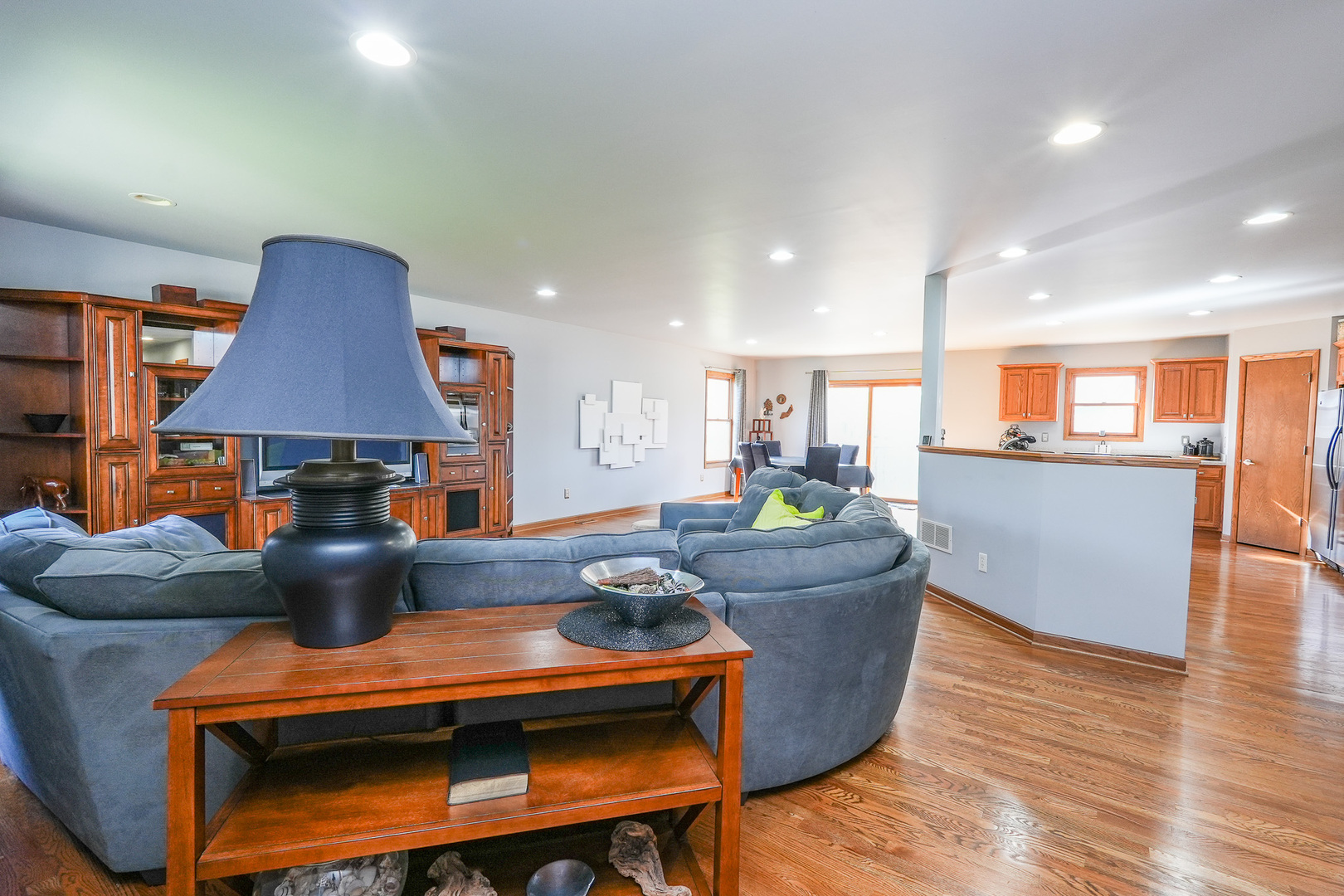 1135 Eagle Circle Bourbonnais, IL 60914 - Photo 7 of 36 a living room with furniture and wooden floor