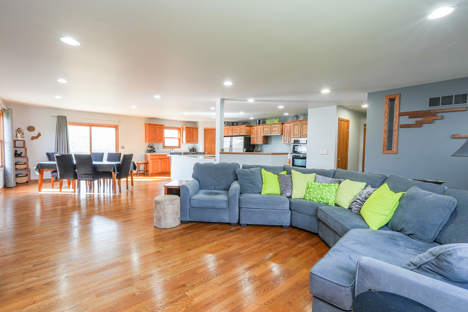 1135 Eagle Circle Bourbonnais, IL 60914 - Photo 8 of 36 a living room with furniture and a wooden floor