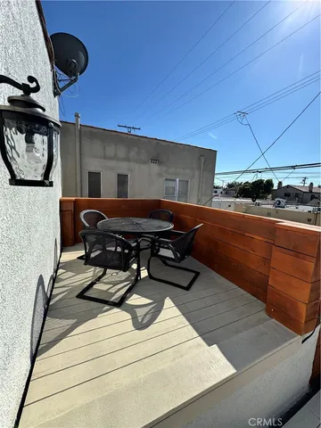 a living room with a couch and a stove