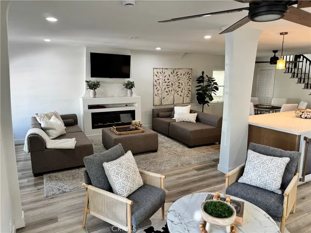 a kitchen with a table and chairs