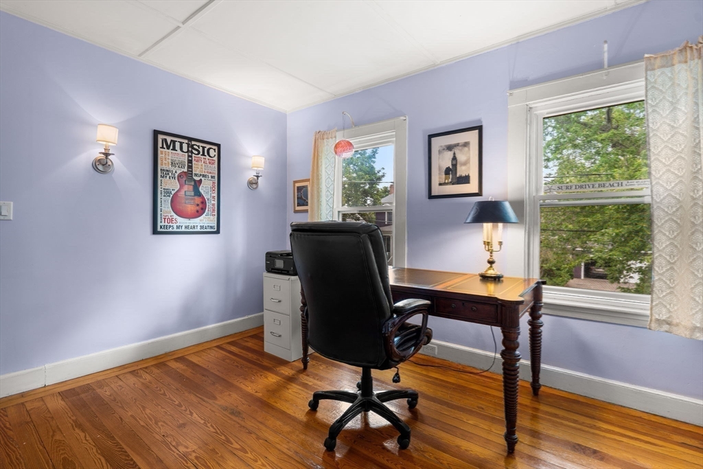 15 Beacon Street Danvers, MA 01923 - Photo 13 of 42 a view of a workspace with furniture and a window