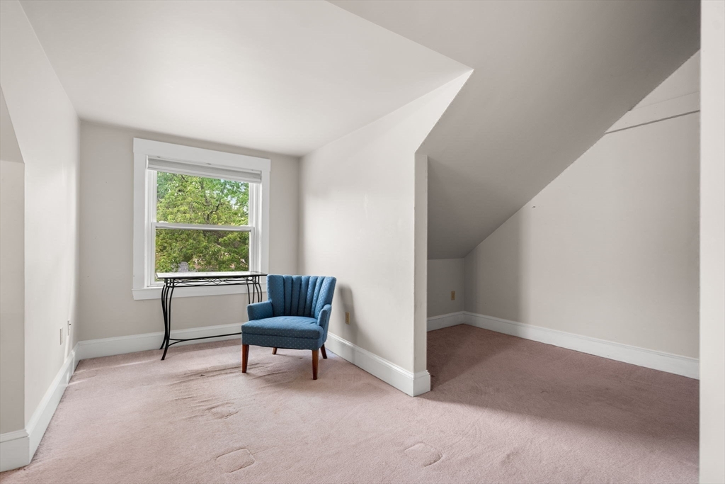 15 Beacon Street Danvers, MA 01923 - Photo 25 of 42 a living room with furniture and a window