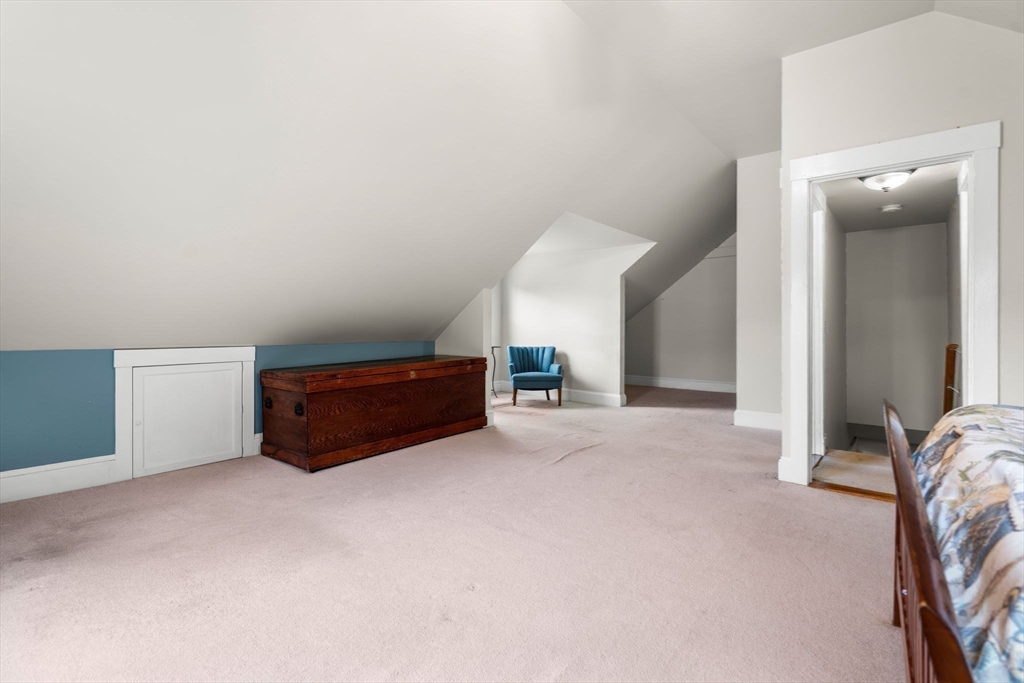 15 Beacon Street Danvers, MA 01923 - Photo 26 of 42 a room with furniture and a gate