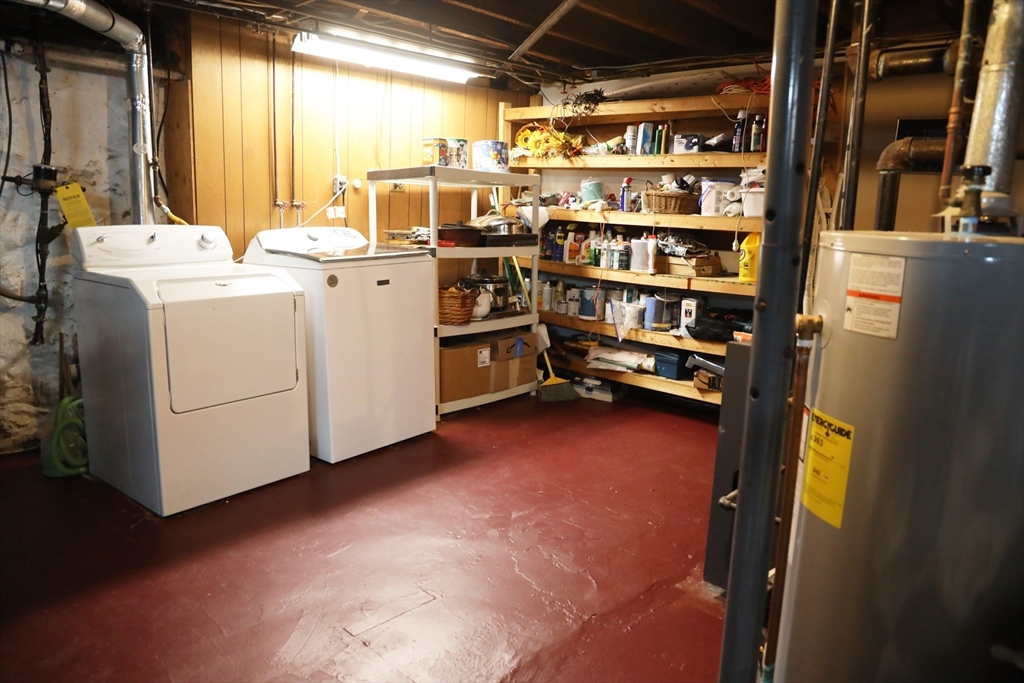 15 Beacon Street Danvers, MA 01923 - Photo 30 of 42 a view of storage and utility room with washer and dryer