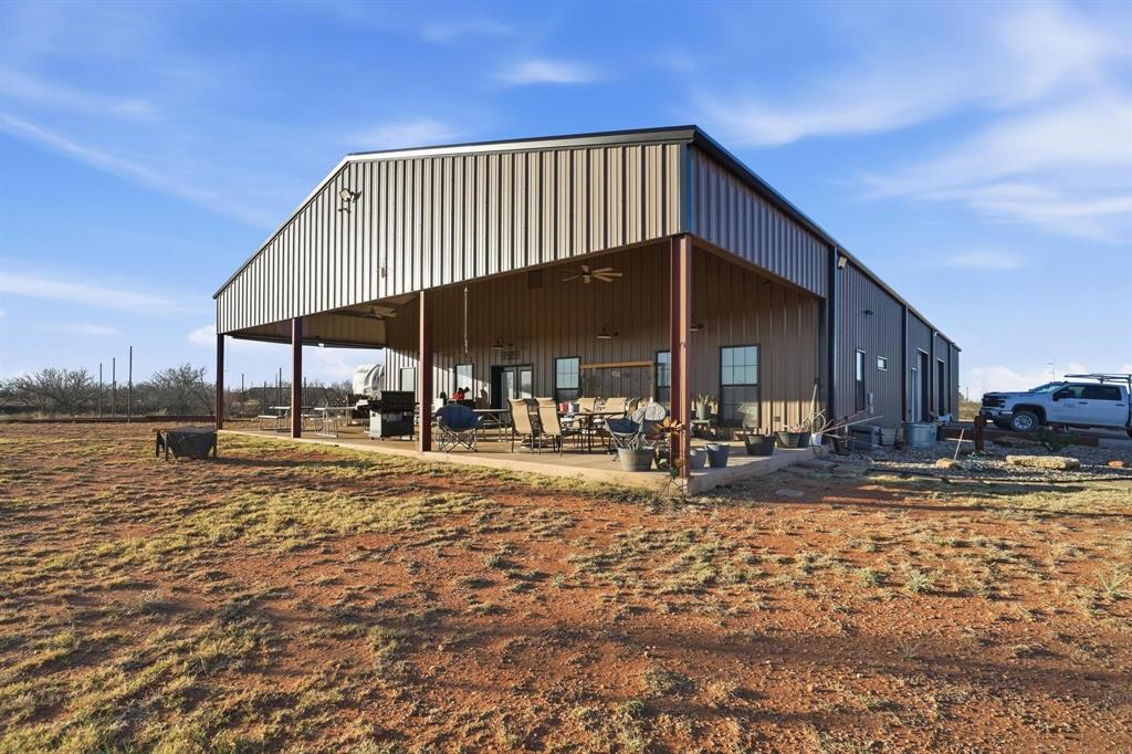 6499 Summerhill Road Abilene, TX 79601 - Photo 5 of 36 a view of a house with a patio