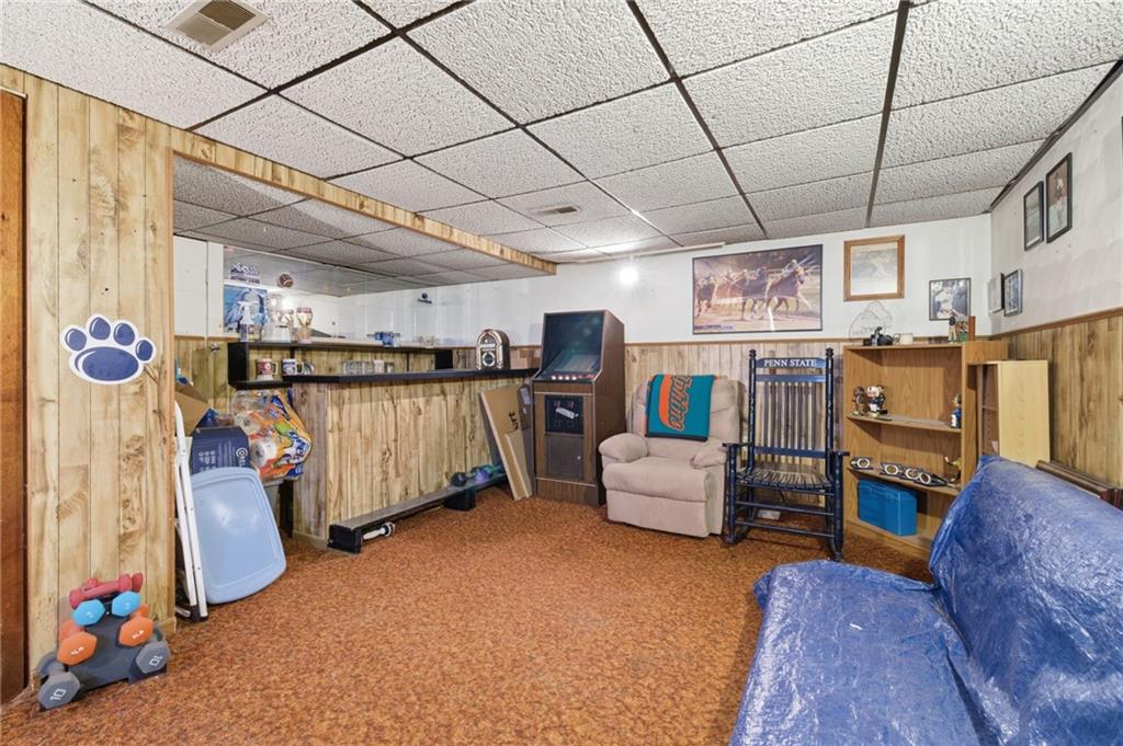 117 Overbrook Boulevard Pittsburgh, PA 15210 - Photo 20 of 30 a storage room with furniture and a flat screen tv