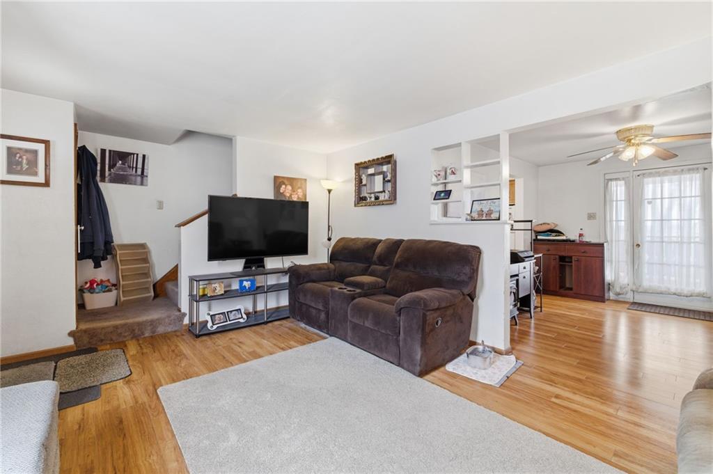 117 Overbrook Boulevard Pittsburgh, PA 15210 - Photo 5 of 30 a living room with furniture and a flat screen tv