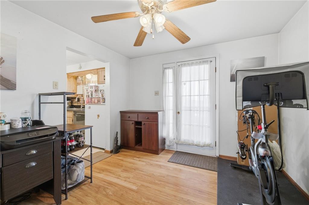 117 Overbrook Boulevard Pittsburgh, PA 15210 - Photo 7 of 30 a view of a workspace with furniture and a window