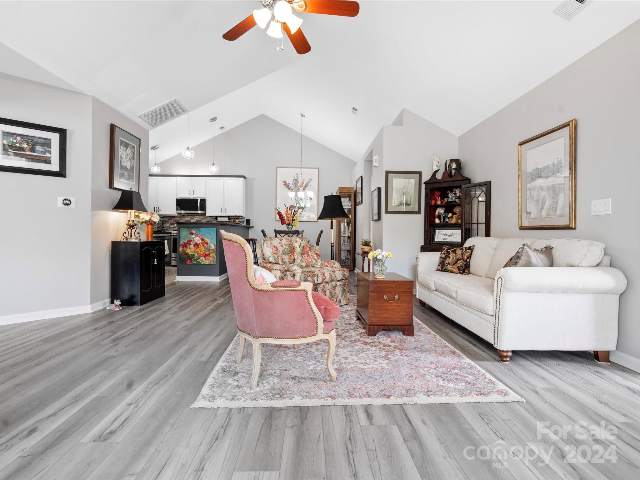 707 Ledgestone Court Fort Mill, SC 29708 - Photo 14 of 40 a living room with furniture and a wooden floor