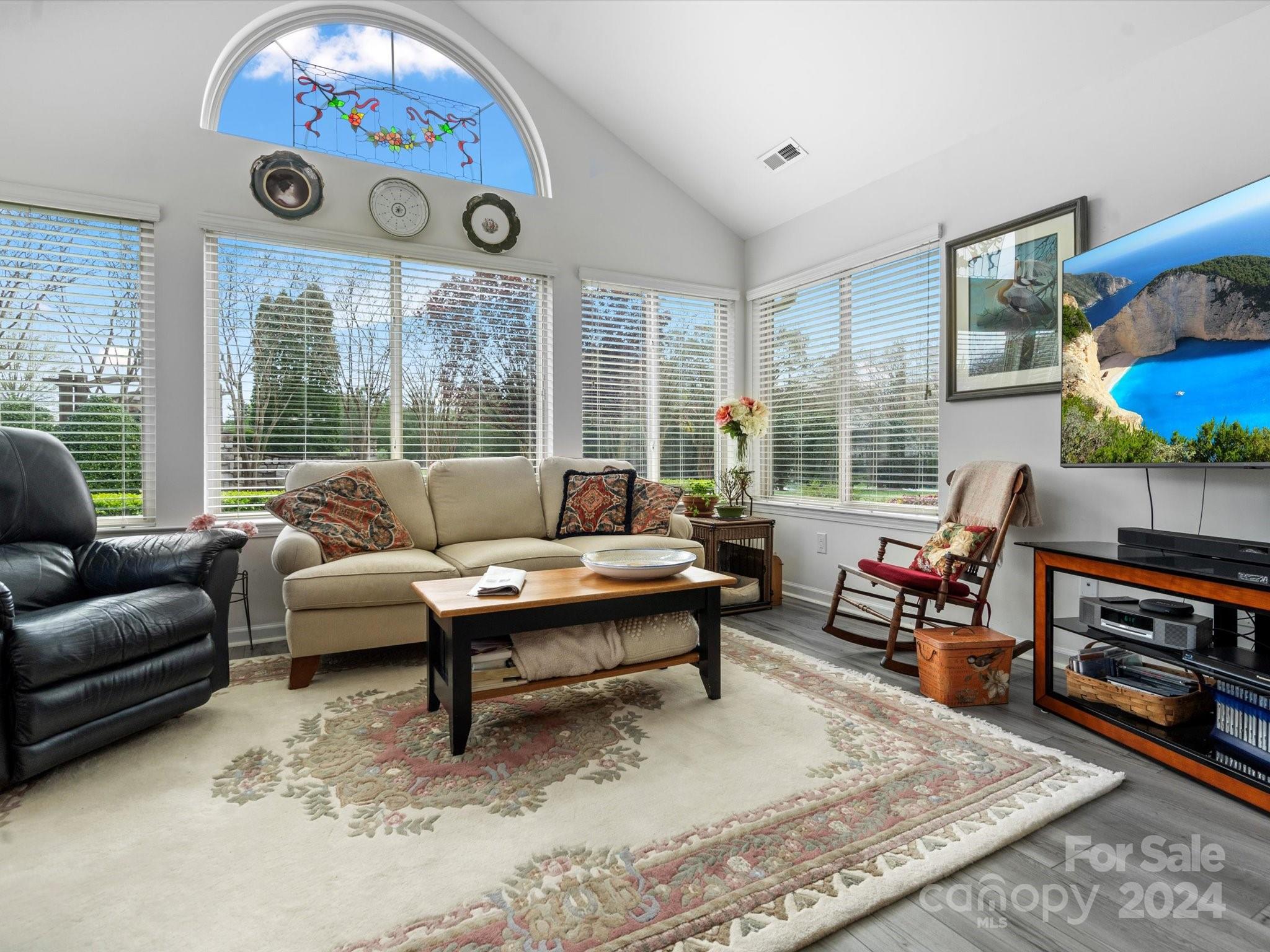 707 Ledgestone Court Fort Mill, SC 29708 - Photo 16 of 40 a living room with furniture and a large window