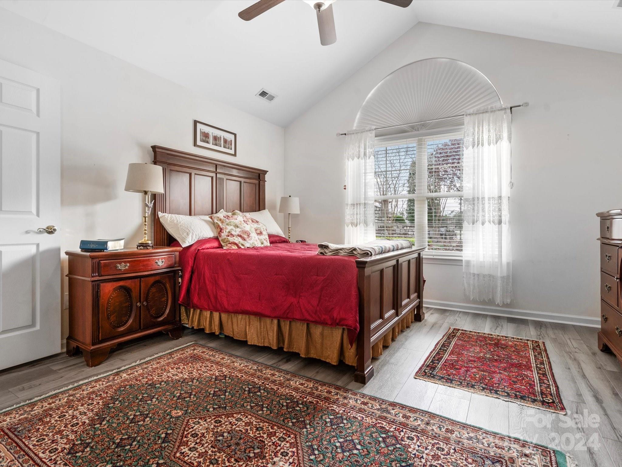 707 Ledgestone Court Fort Mill, SC 29708 - Photo 18 of 40 a bedroom with a bed a window and walk in closet