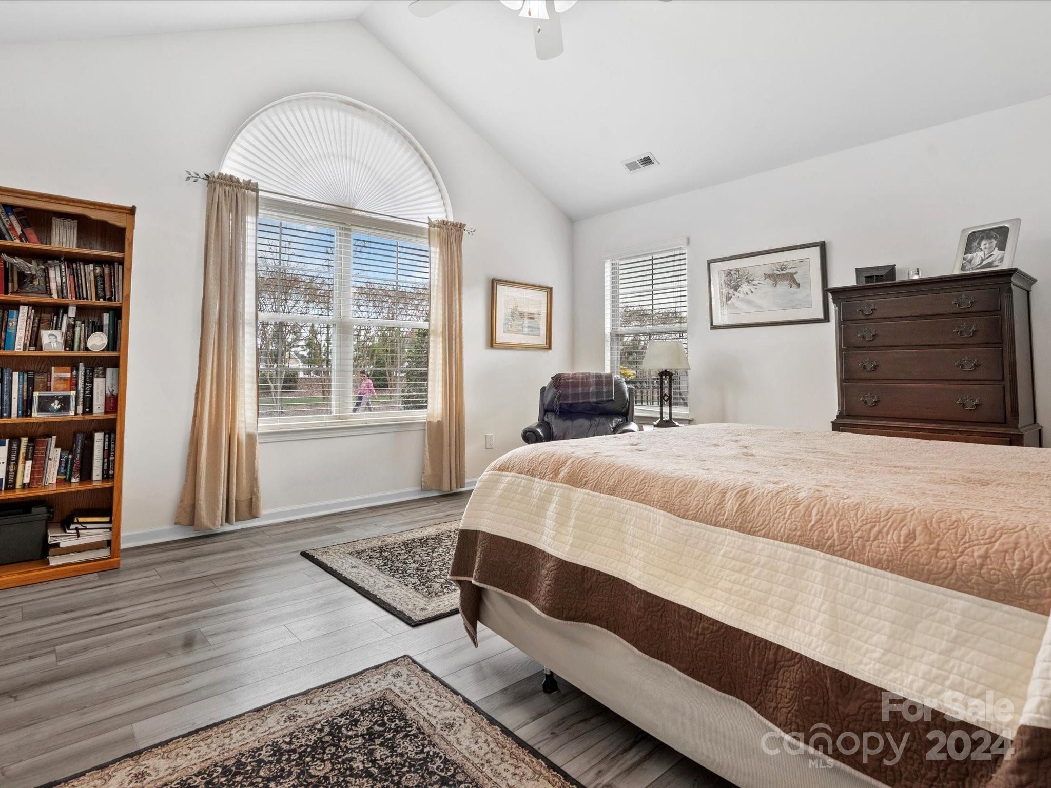 707 Ledgestone Court Fort Mill, SC 29708 - Photo 24 of 40 a bedroom with a large bed and a window