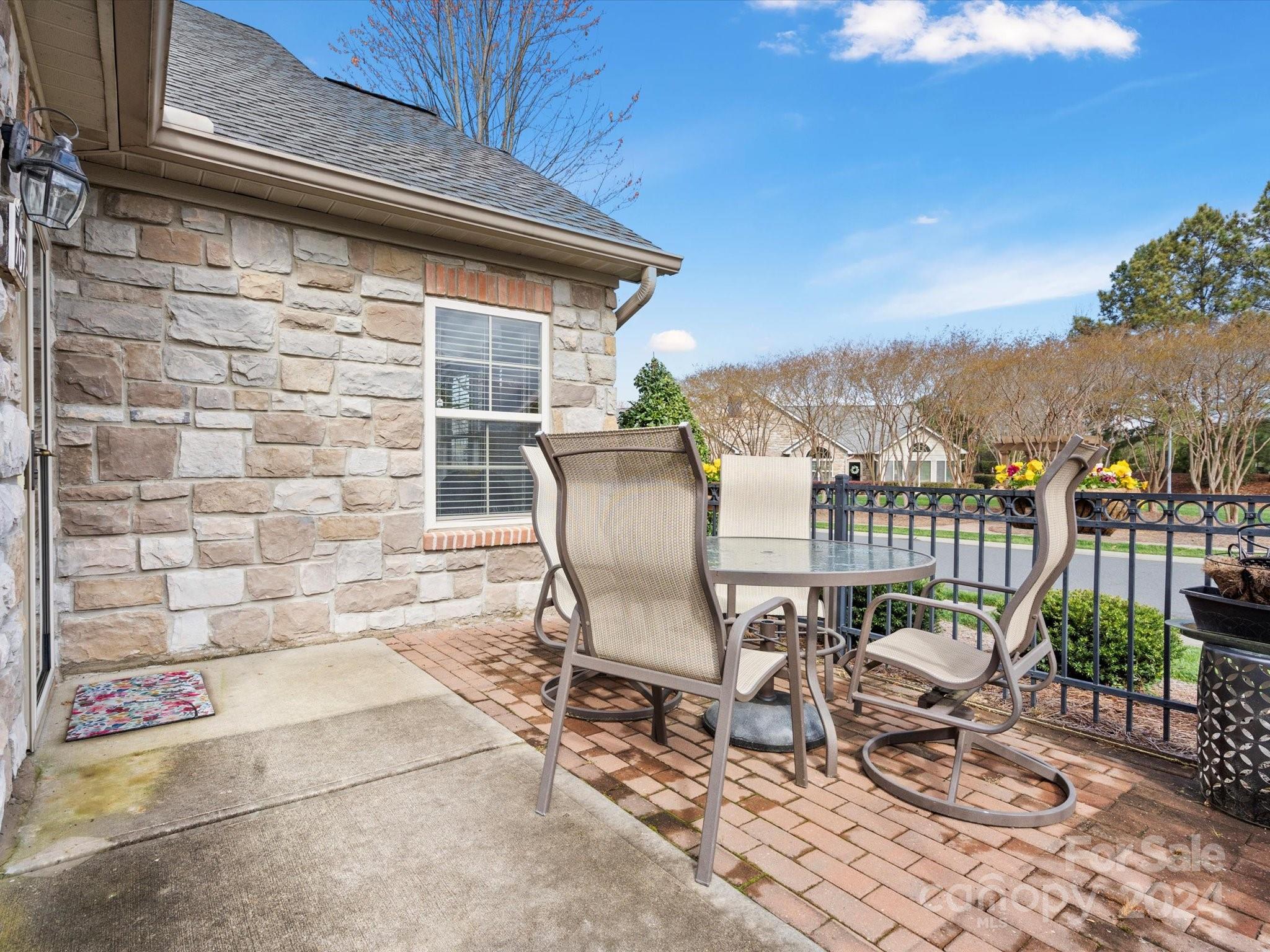 707 Ledgestone Court Fort Mill, SC 29708 - Photo 29 of 40 a view of a chairs and table in patio