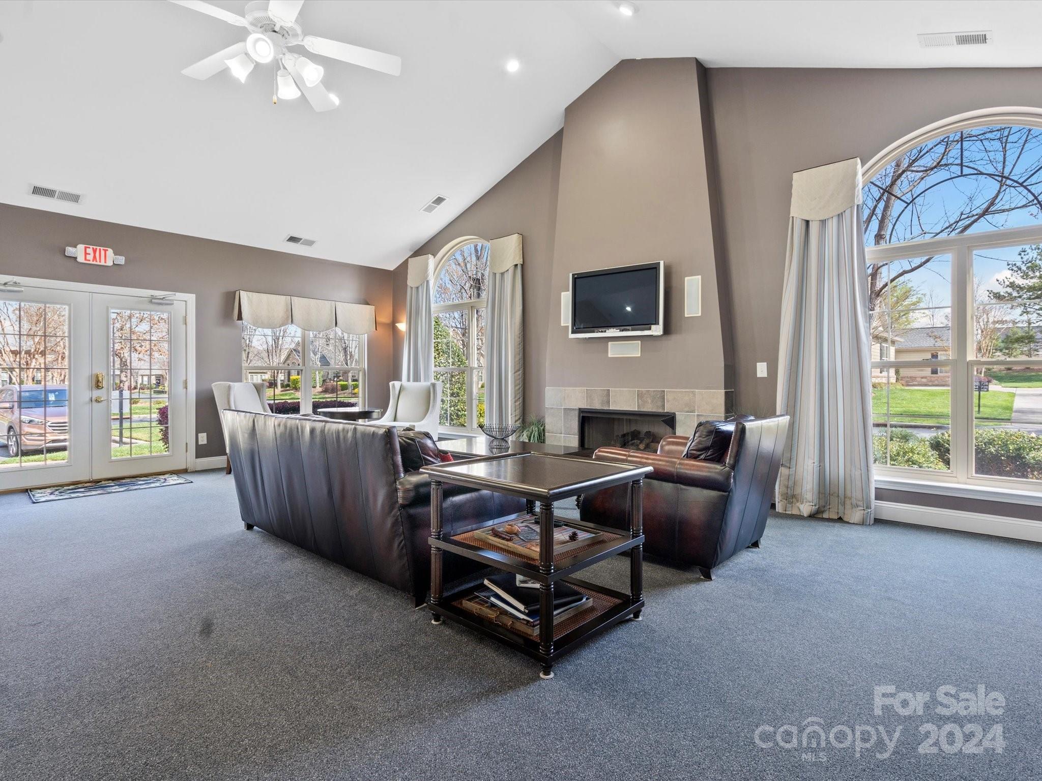 707 Ledgestone Court Fort Mill, SC 29708 - Photo 36 of 40 a living room with furniture and a flat screen tv