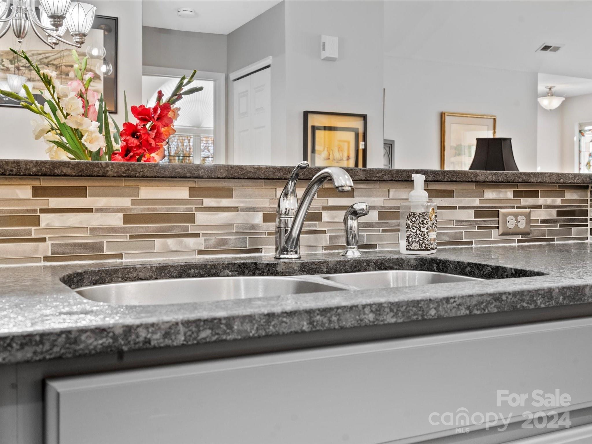 707 Ledgestone Court Fort Mill, SC 29708 - Photo 6 of 40 a kitchen with sink and cabinets