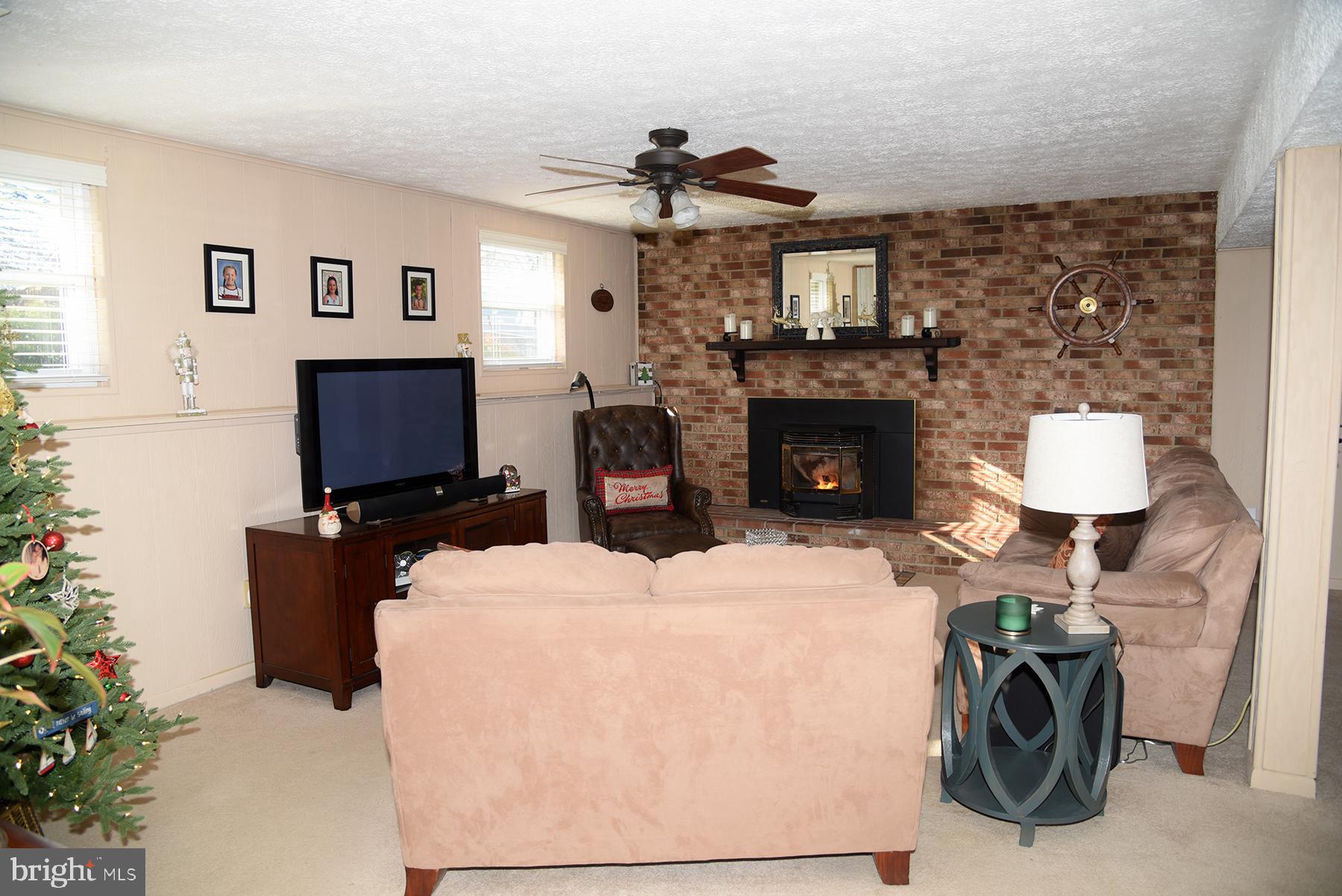 770 Rosewood Road Severn, MD 21144 - Photo 18 of 30 Comfy and cozy family room with pellet stove