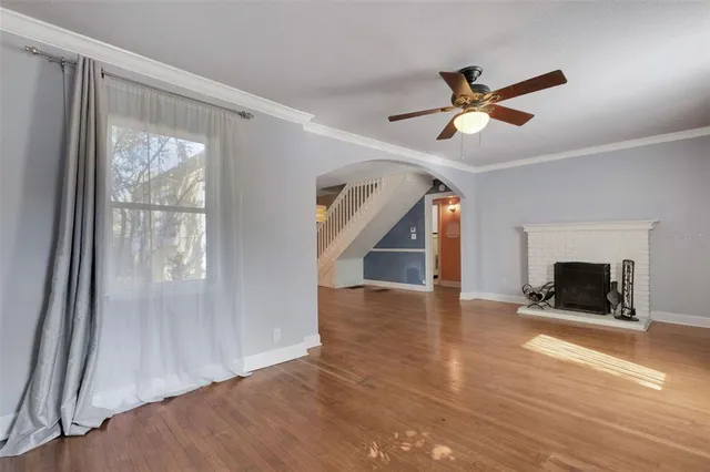 a view of a kitchen with a sink and a kitchen counter top space