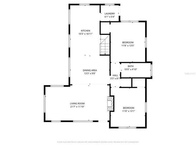 a view of a wooden fence with trees in the background