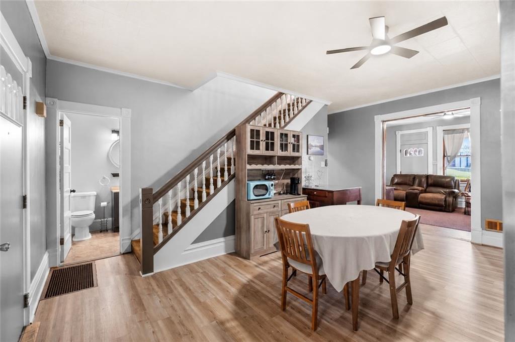6 West Market Street Burgettstown, PA 15021 - Photo 10 of 24 a view of a dining room with furniture and wooden floor
