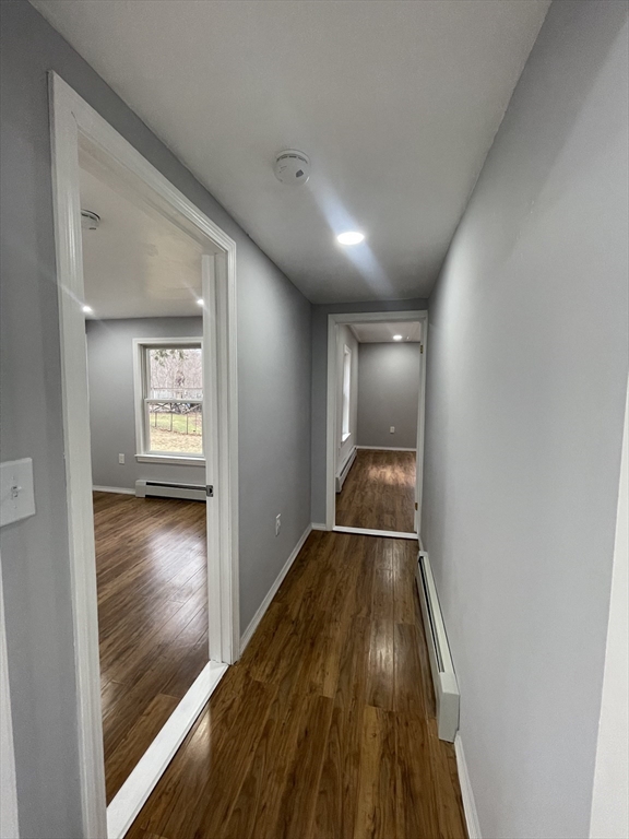 59 High Street Warren, MA 01083 - Photo 16 of 42 a view of hallway with wooden floor