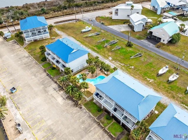 $229,000 | 411 Admiral Craik Drive, Unit 17, Grand Isle, LA 70358