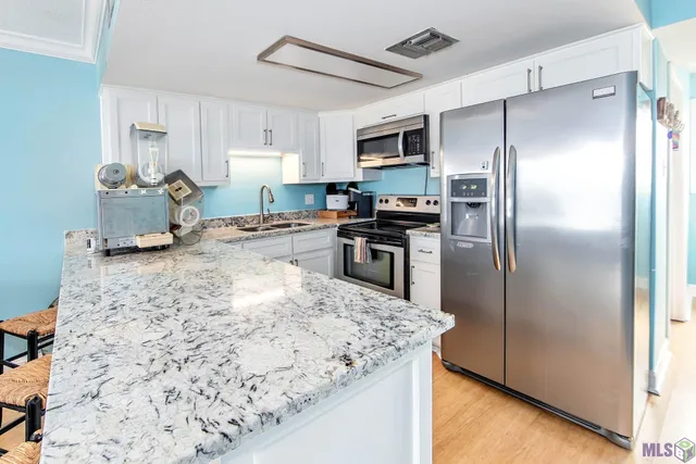 $229,000 | 411 Admiral Craik Drive, Unit 17, Grand Isle, LA 70358
