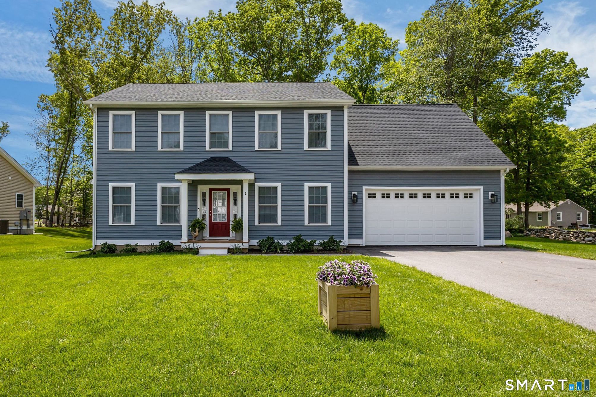 2 Martys Way Gales Ferry, CT 06335 - Photo 1 of 40 a view of a house with a yard and a patio