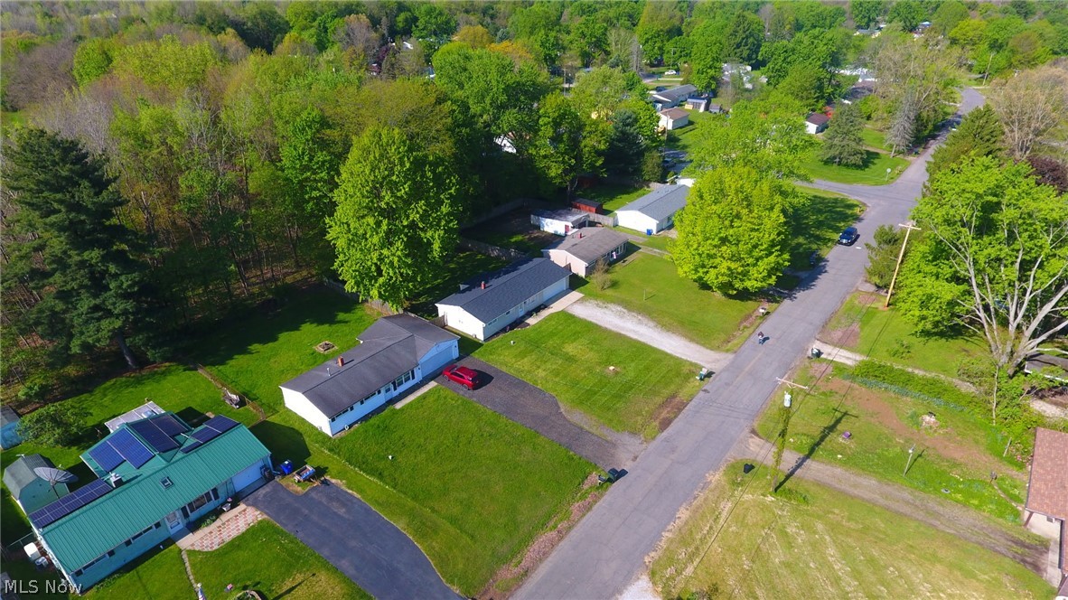3070 Polly Road Ravenna, OH 44266 - Photo 33 of 38 Residential street featuring a collection of properties with mature trees and green spaces