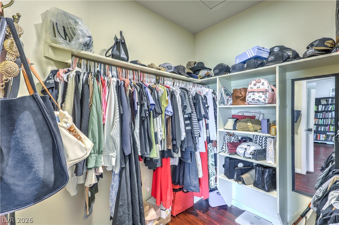 580 Lillian Condie Road Overton, NV 89040 - Photo 27 of 37 Ample hanging space and built-in shelving create a well-appointed and organized closet.