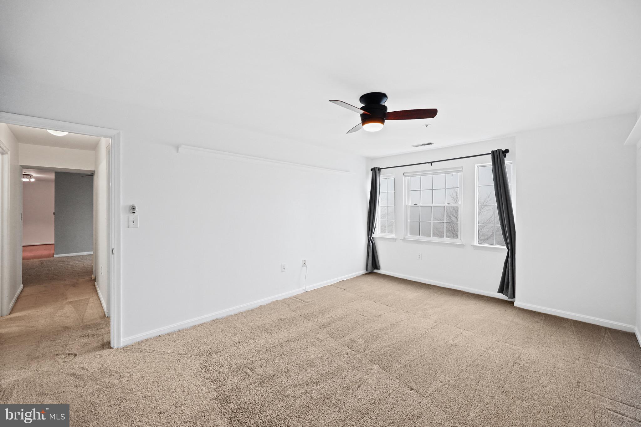 8384 Montgomery Run Road, Unit G Ellicott City, MD 21043 - Photo 14 of 28 Owner's Bedroom w/ large windows for lots of light