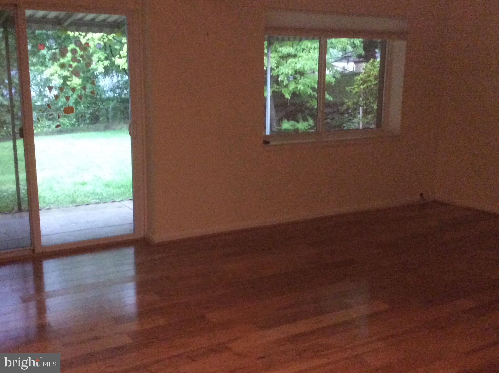 608 Winona Court Silver Spring, MD 20902 - Photo 10 of 28 Large family room with hardwood