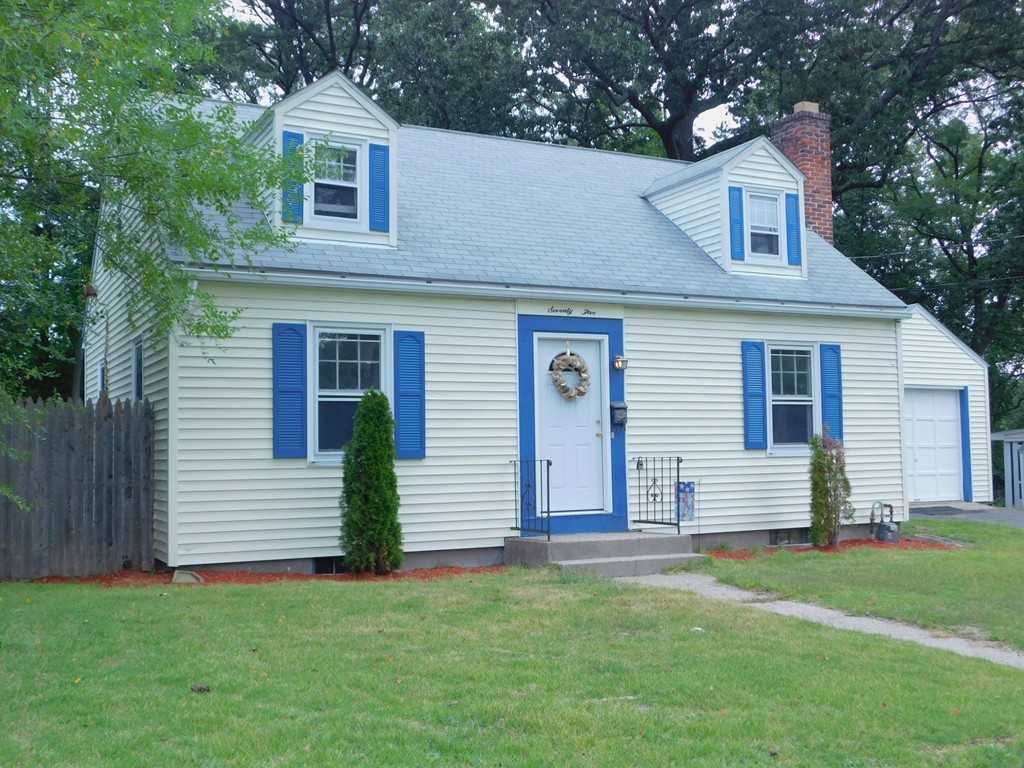 a front view of house with yard