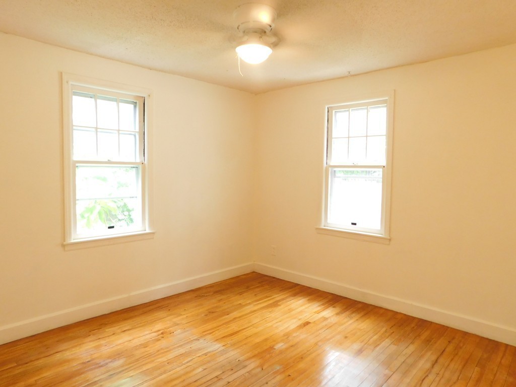 75 Anniversary Street Springfield, MA 01104 - Photo 10 of 12 an empty room with a window