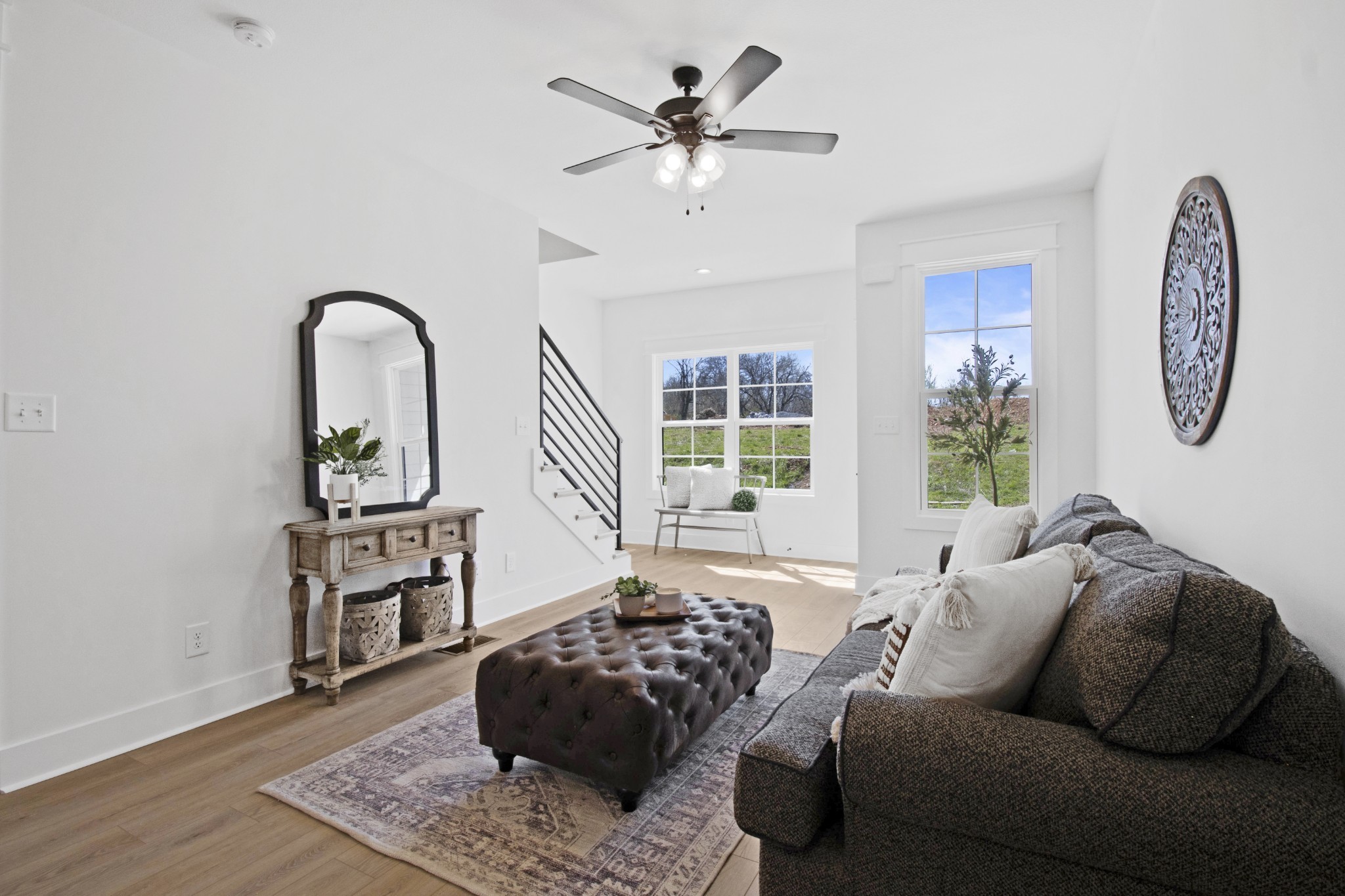 41 West High Street, Unit D6 Clarksville, TN 37040 - Photo 8 of 29 a living room with furniture and a large window