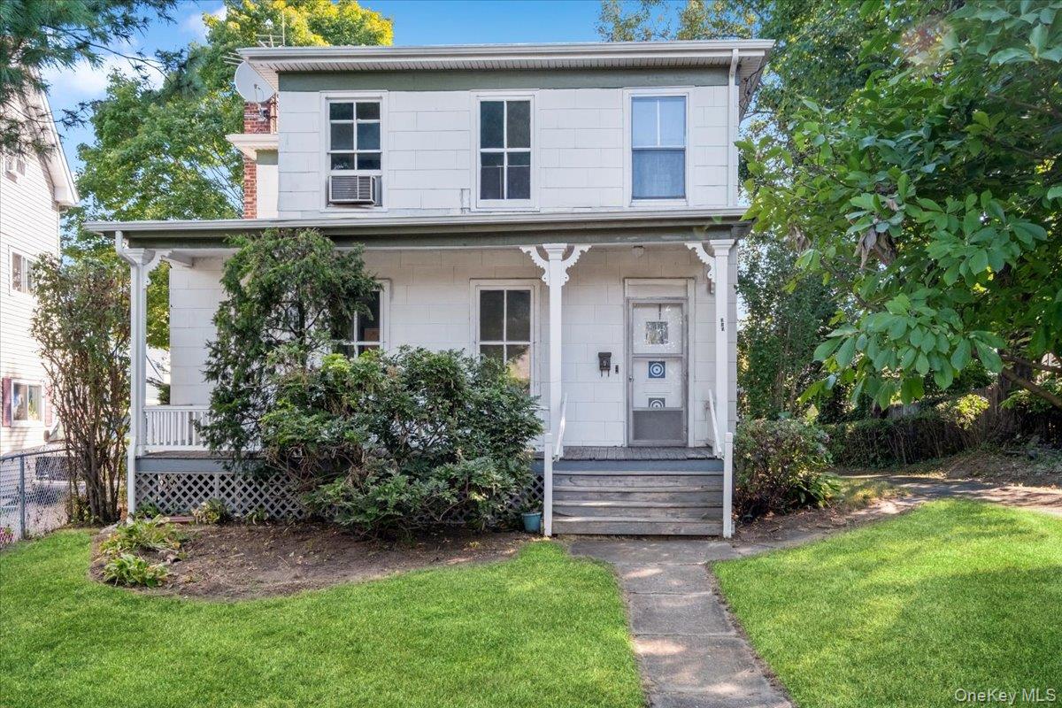 315 Fenimore Road Mamaroneck, NY 10543 - Photo 1 of 1 View of front of property featuring covered porch and a front lawn