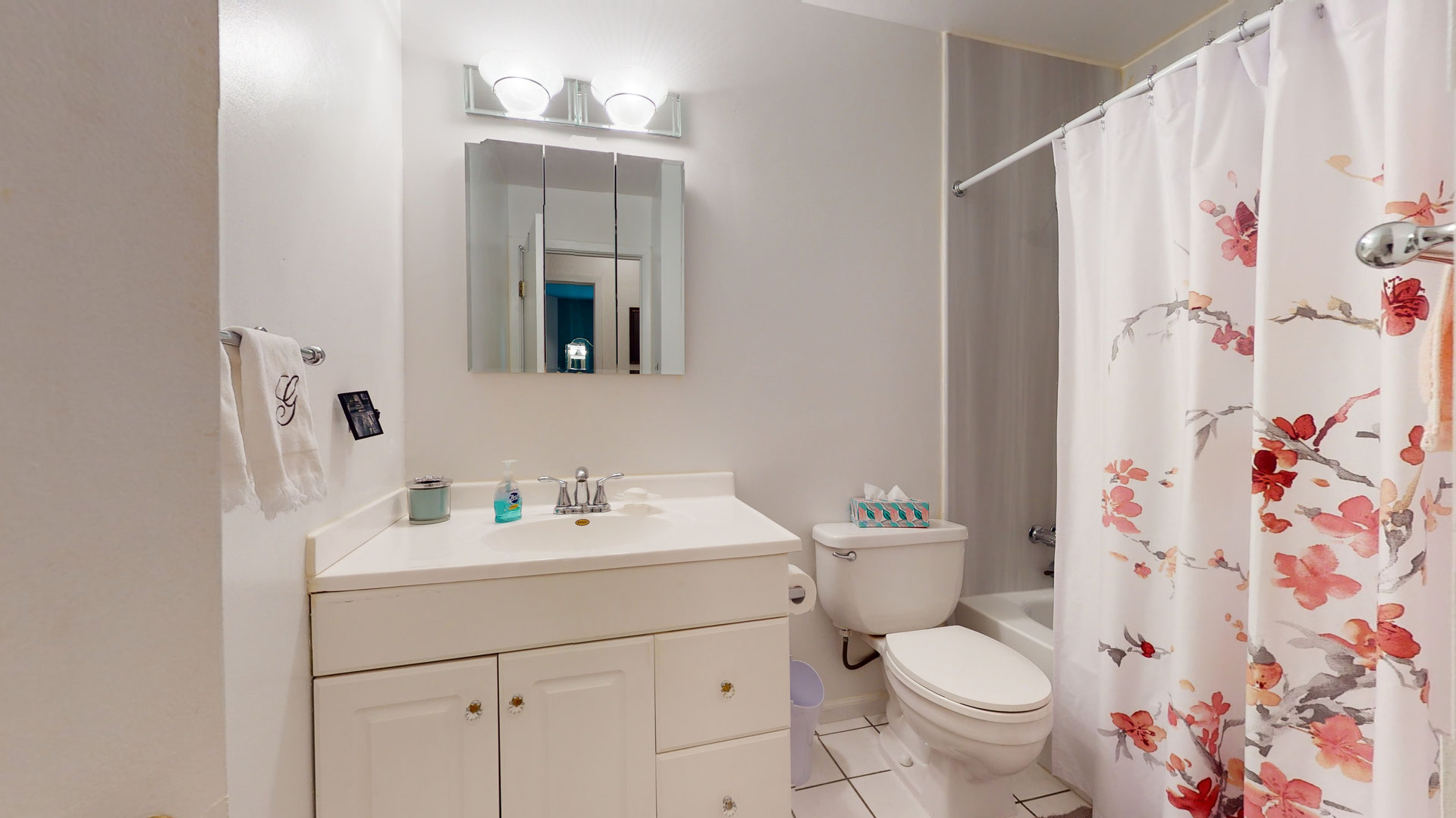 101 Stonegate Road Buffalo Grove, IL 60089 - Photo 16 of 18 a bathroom with a sink toilet and shower