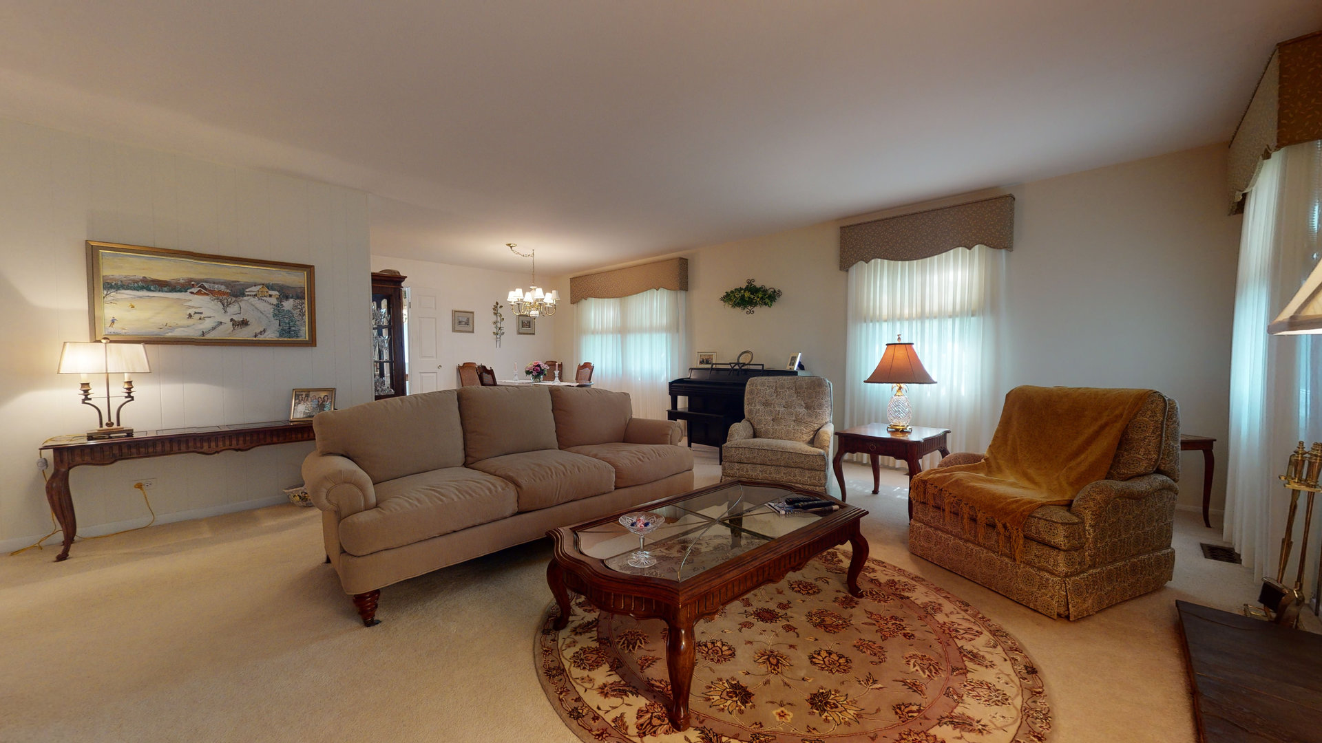 101 Stonegate Road Buffalo Grove, IL 60089 - Photo 8 of 18 a living room with furniture a lamp and a window
